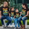 Family wearing matching personalized vacation T-shirts with sunset beach design customized for Goa trip 2026