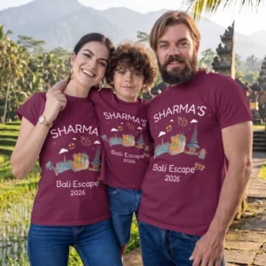 Family wearing personalized vacation mode matching t-shirts with custom name printed, sitting together during a trip