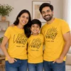 Family wearing matching yellow Vacay Vibes Manali 2026 T-shirts for parents and kids with sunset design