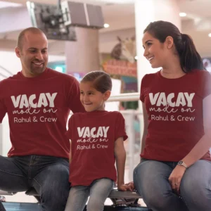 Family wearing matching red personalized “Vacay Mode On” T-shirts with custom name printed, perfect for travel and vacation outfits