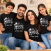 Family wearing personalized black Vacay Squad Goa 2026 matching T-shirts with palm trees, sun and vacation design