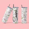 Personalized floral tumbler with custom name printed in elegant script, featuring a soft botanical design and reusable straw.