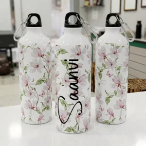 Personalized floral water bottle with custom name printed in elegant typography, designed for girls and everyday use