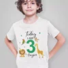 Kid wearing a personalized jungle safari birthday t-shirt with name Aayan and age 3 featuring lion, giraffe, and animal illustrations