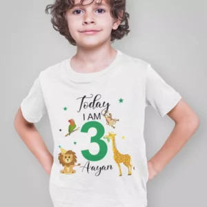 Kid wearing a personalized jungle safari birthday t-shirt with name Aayan and age 3 featuring lion, giraffe, and animal illustrations