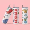 Personalized kids tumbler with colorful cartoon dinosaur design and custom name printed, featuring a lid and straw for school use