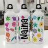 Personalized kids water bottle with colorful floral design and custom name printed on white metal bottle