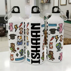 Personalized kids water bottle with name Ishaan printed in bold and cute cartoon school themed design with animals and icons
