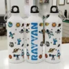 Personalized kids water bottle with space theme design featuring astronaut, rockets, and custom name print