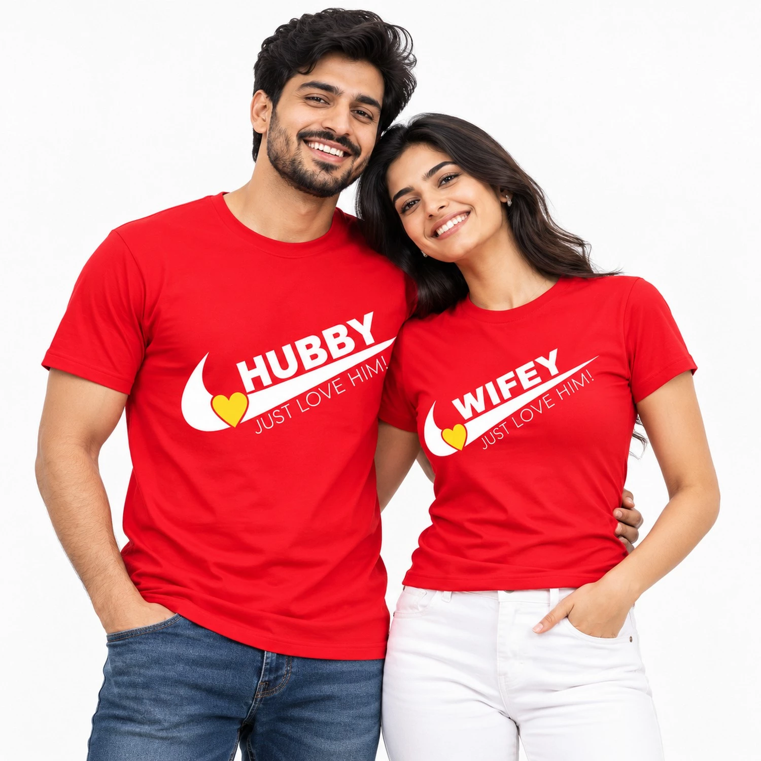 Indian couple wearing matching red HUBBY and WIFEY T-shirts with bold white lettering, curved swoosh graphics, yellow hearts, and JUST LOVE HIM text.