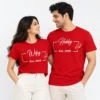 Indian couple wearing red Hubby and Wifey T-shirts featuring white cursive text, rectangular outline graphics, double-heart motifs, and Est. 2026.