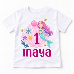 White personalized 1st birthday kids t-shirt flat lay with mermaid birthday print, pink number 1, and the name Inaya