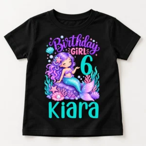 Black personalized kids birthday t-shirt shown in a flat-lay view with a mermaid birthday girl design, number 6, and the name Kiara.