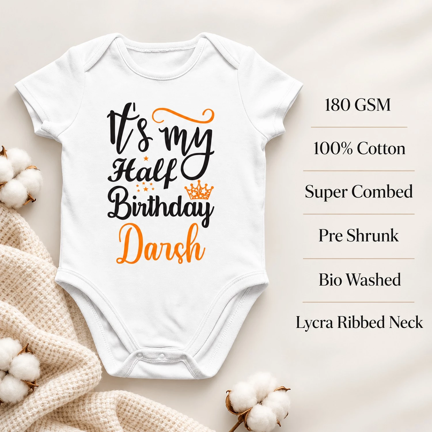 White personalized half birthday baby romper with Darsh design beside fabric feature text including 180 GSM and 100% cotton.